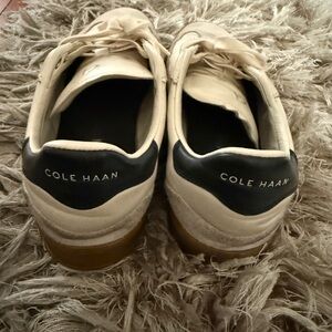 Cole Haan womens Ivory and Black Sneakers